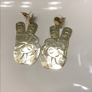 TCU gold earrings